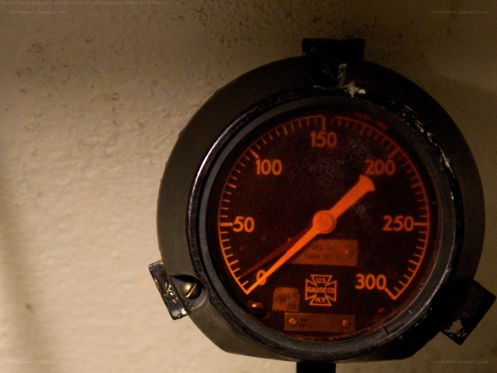 old pressure gauge on wall