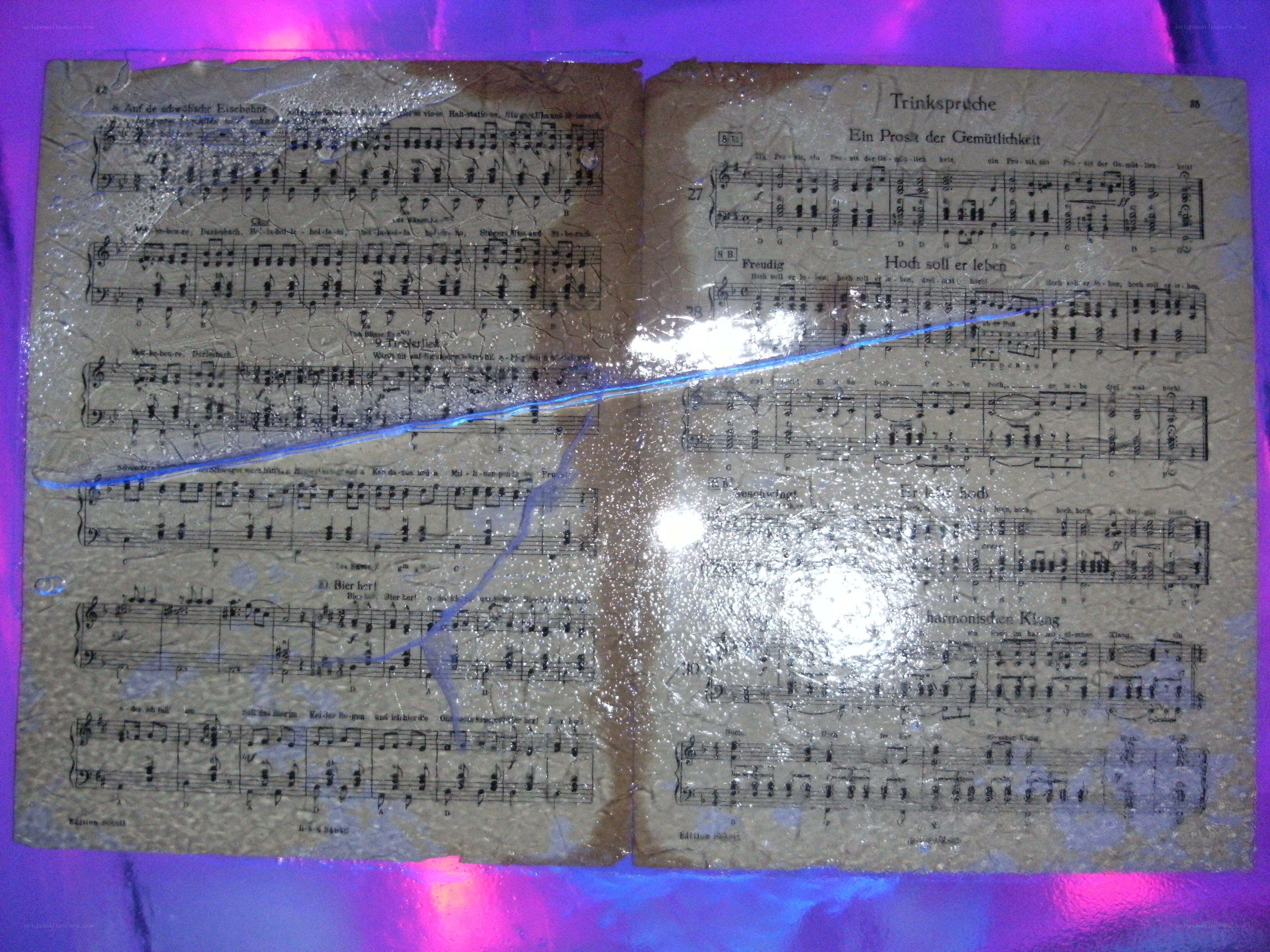 old sheet music under plastic