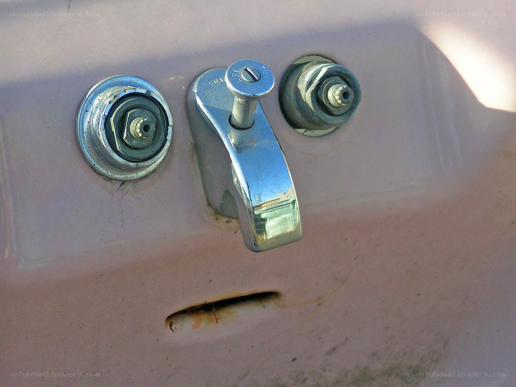 old sink faucet close-up