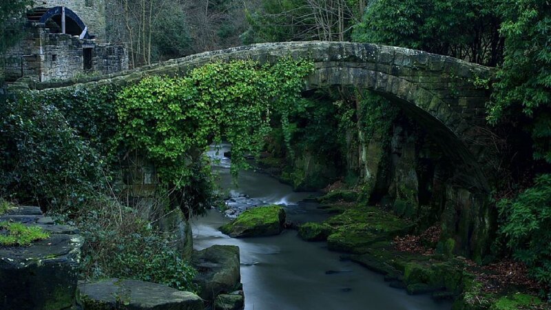 Old stone bridge over river