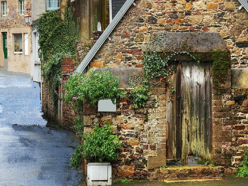 Old stone house with wooden door