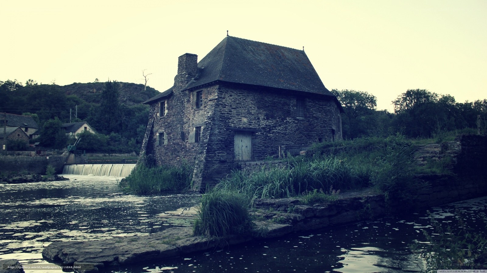 Old stone mill by a river