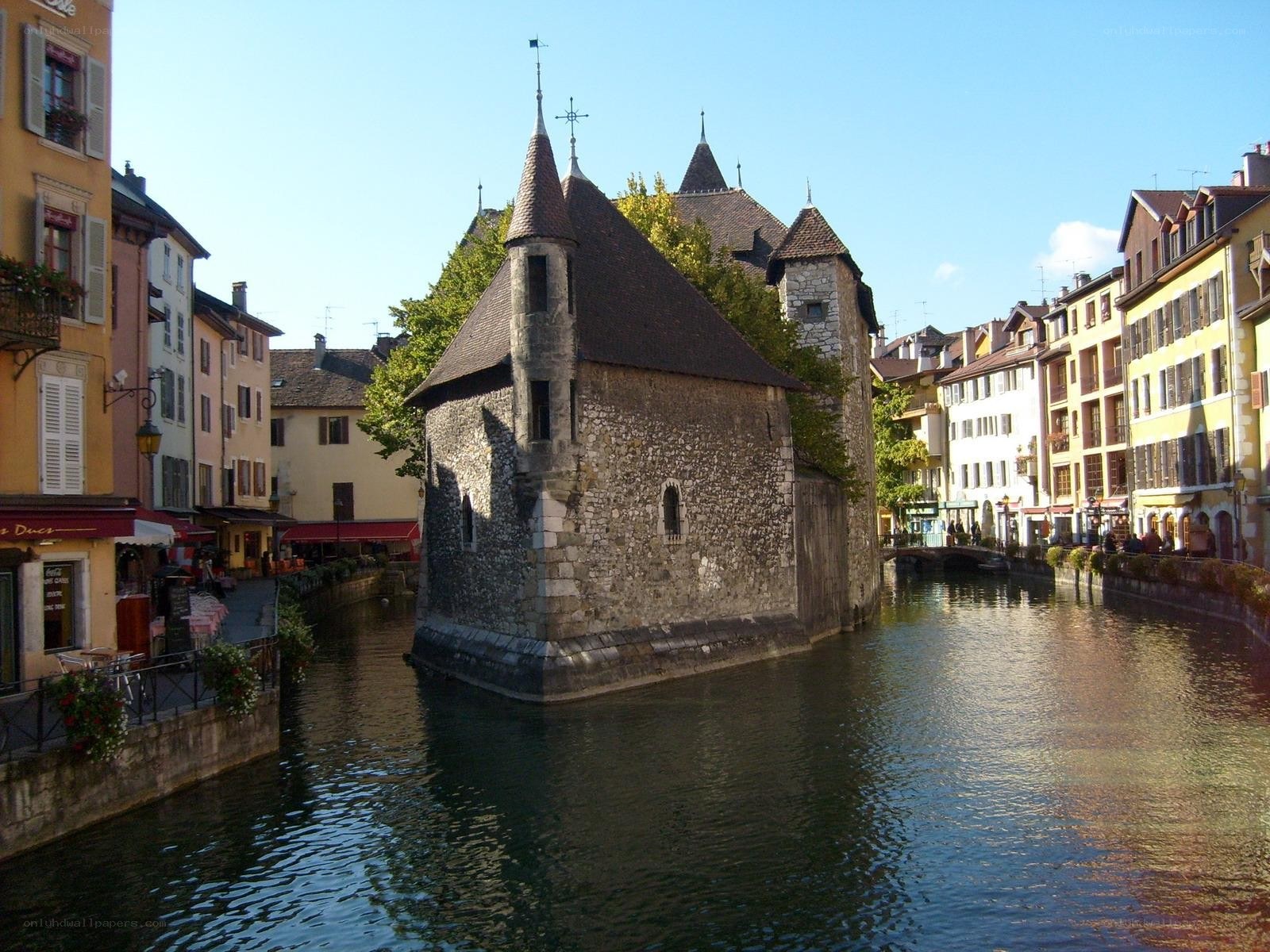 Old stone tower on a canal