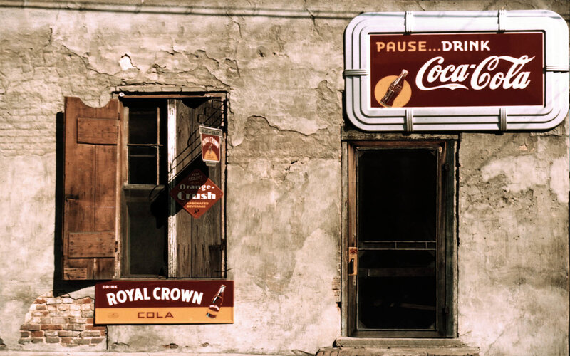 Old storefront with vintage signs
