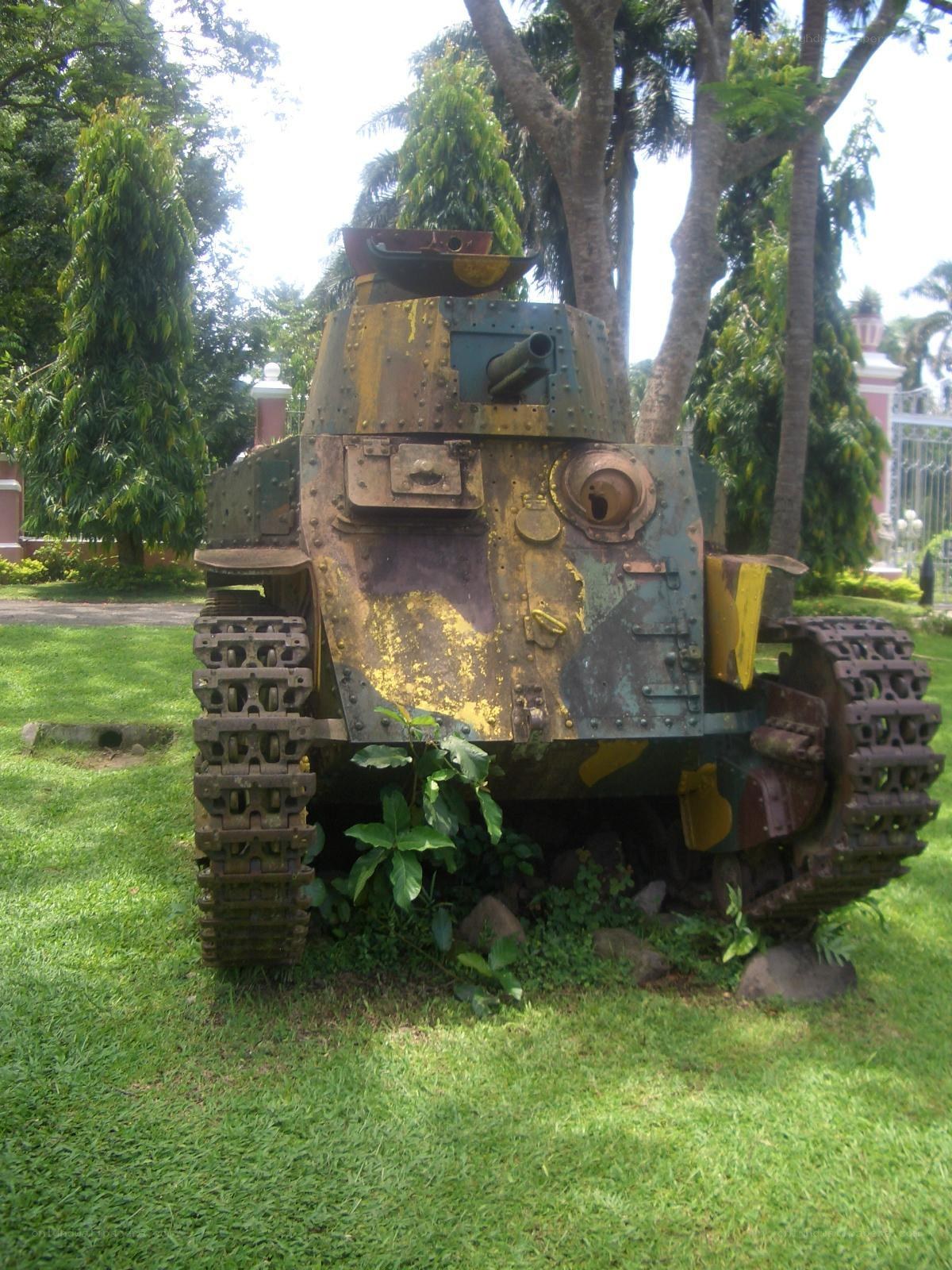 Old tank on display in a park