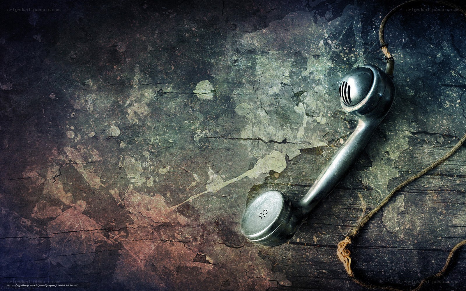 Old telephone on grungy surface