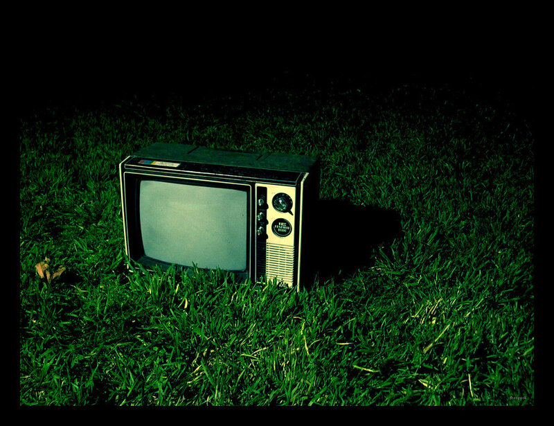 old television in grass