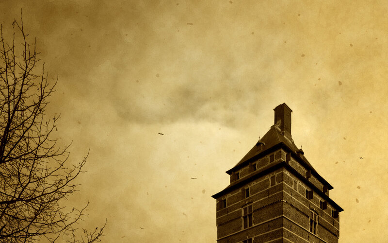 Old tower under cloudy sky
