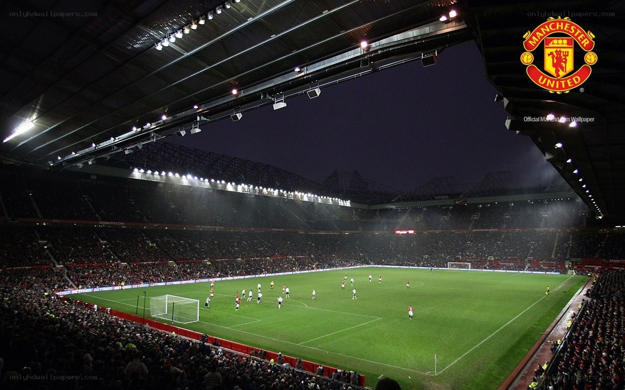 Old Trafford stadium at night