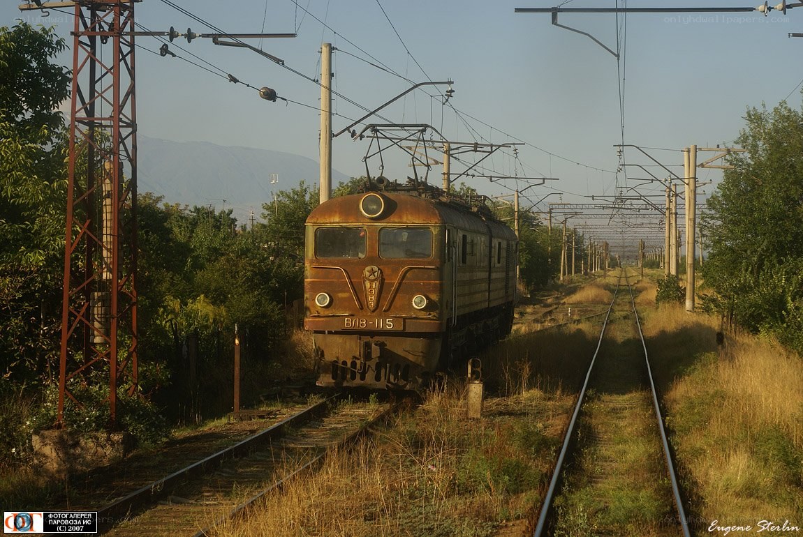 Old train on rural tracks