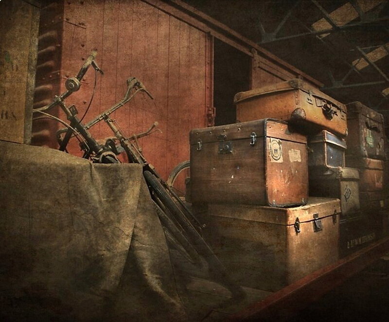 Old trunks and bicycle in a shed