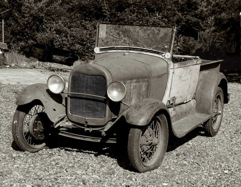 Old vintage car on gravel