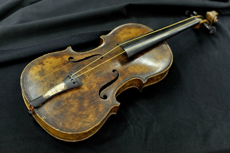 Old Violin on Black Cloth