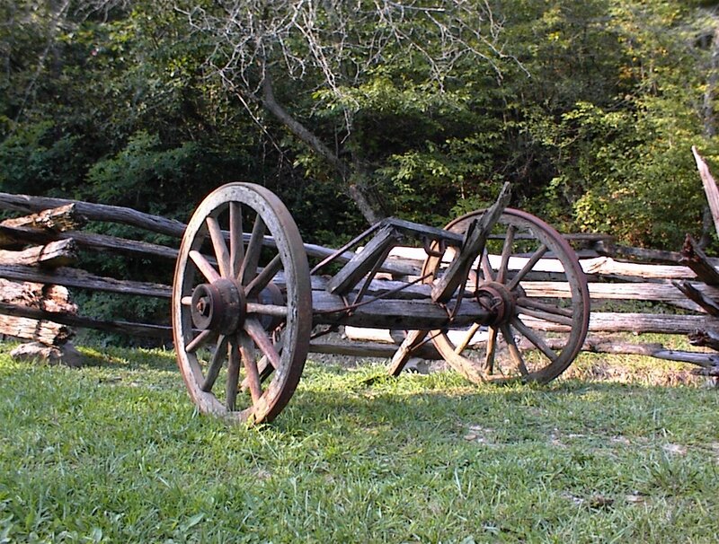 Old wagon in a grassy field
