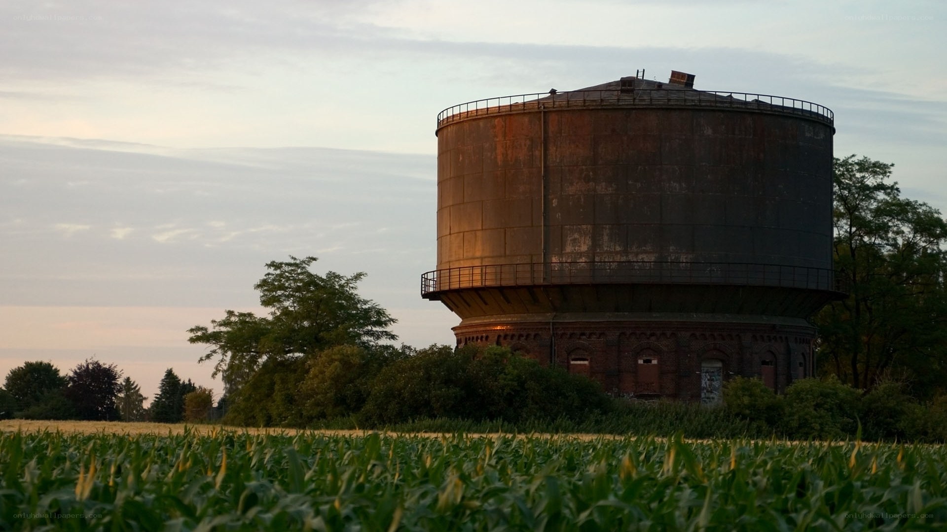 Old water tower in a field