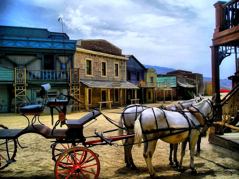 Old west town with horse-drawn carriage