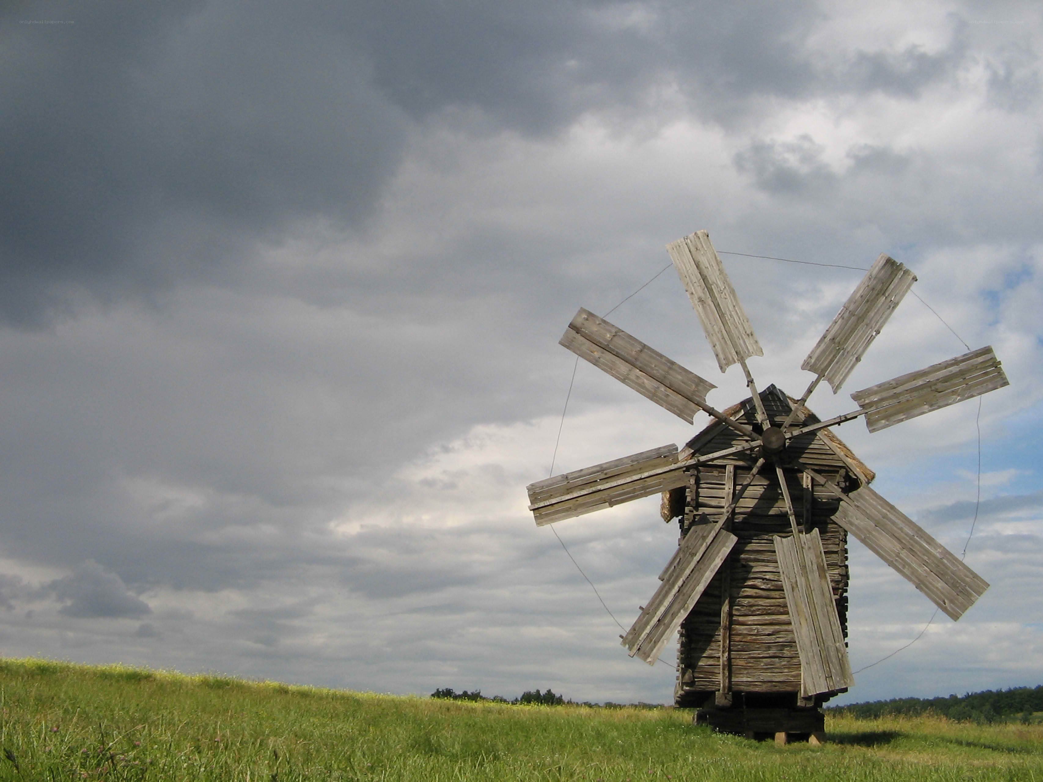 Old windmill on a grassy hill