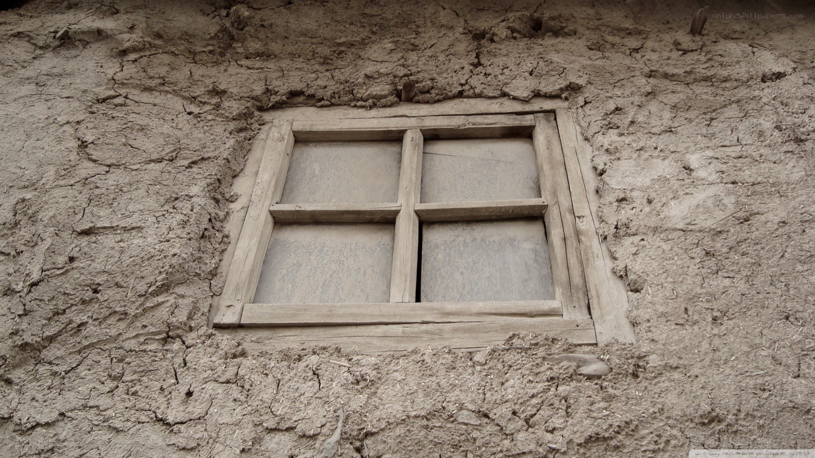 old window in mud wall