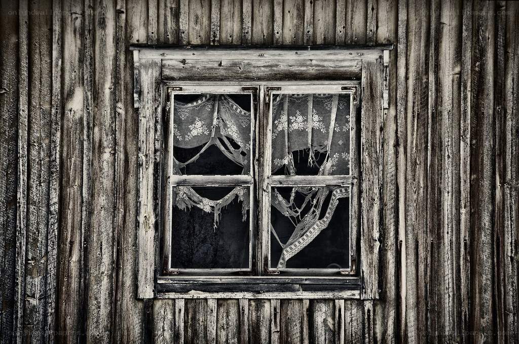 old window in weathered wood