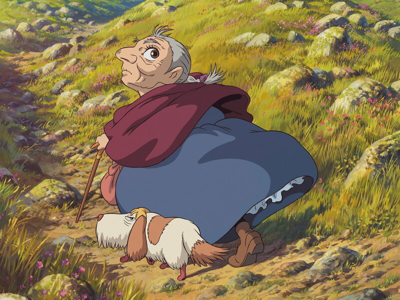 Old woman and dog on a hill
