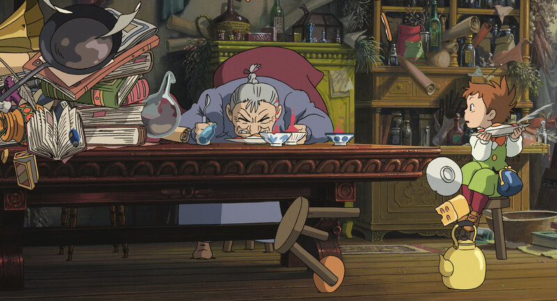 Old woman eating at cluttered table