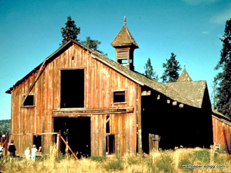 Old wooden barn with bell tower