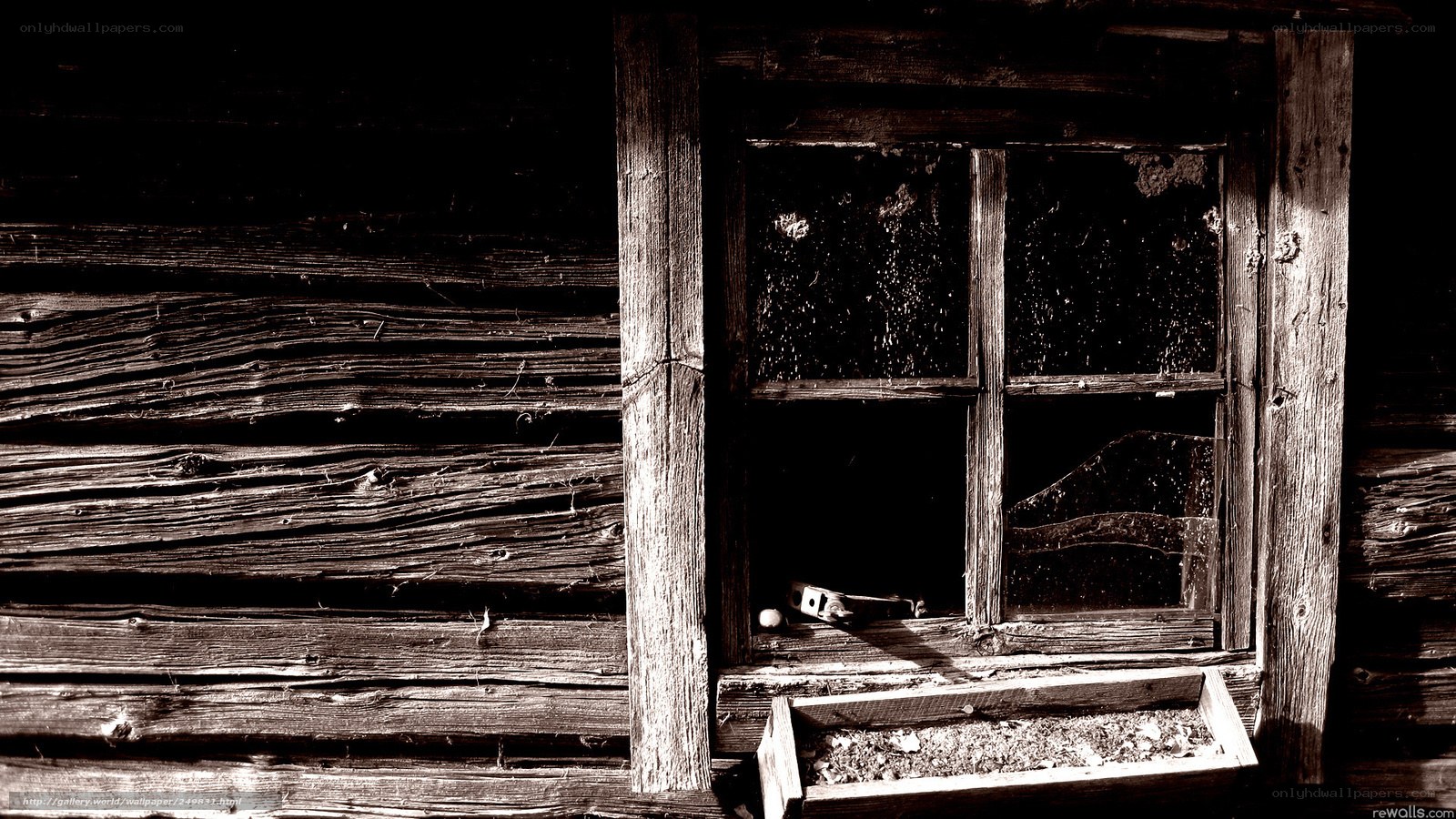 old wooden cabin window