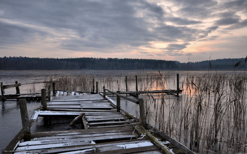 Old wooden dock at sunset