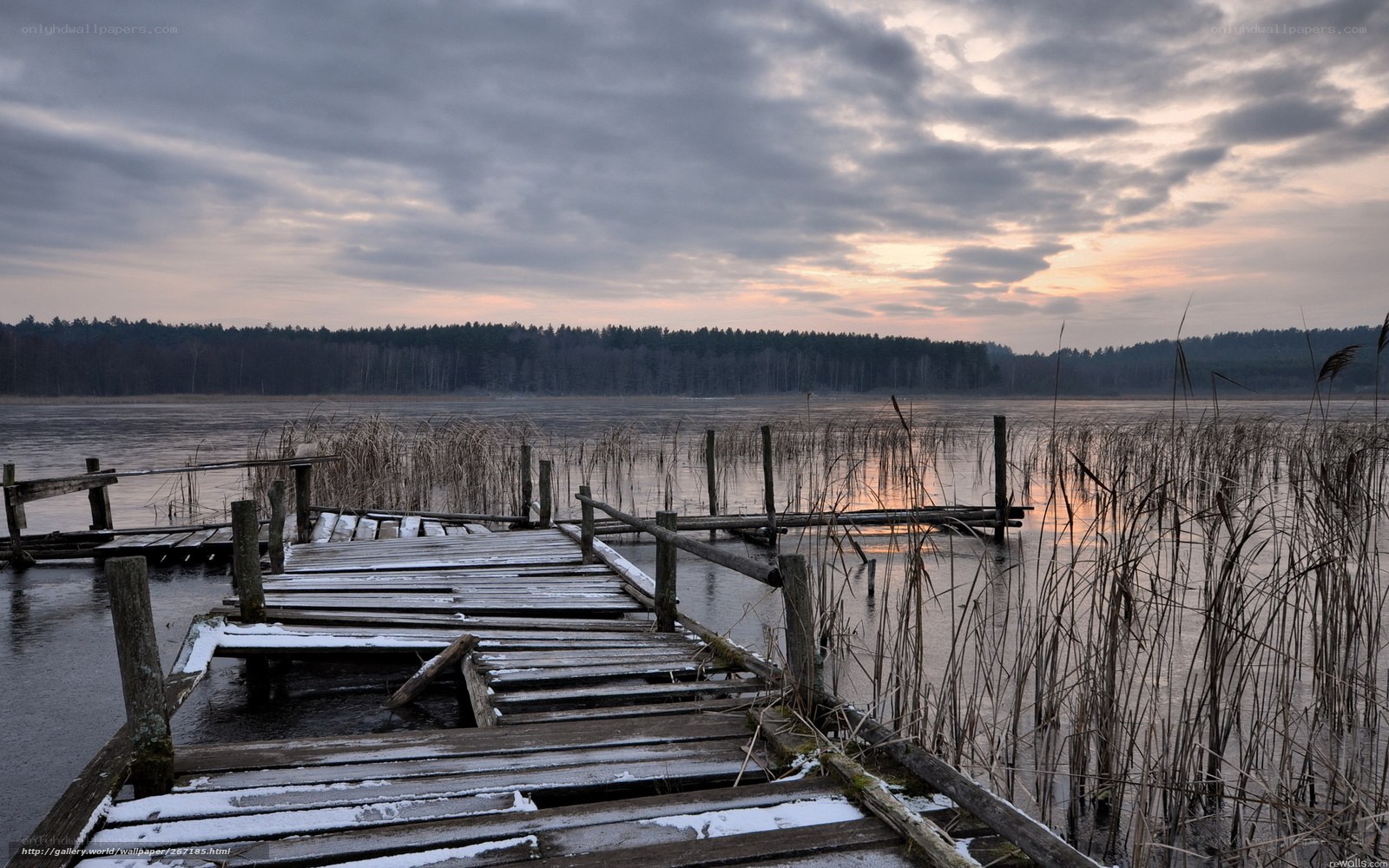 Old wooden dock at sunset