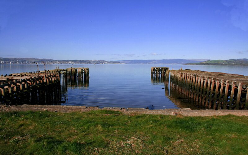 Old wooden piers on a calm bay
