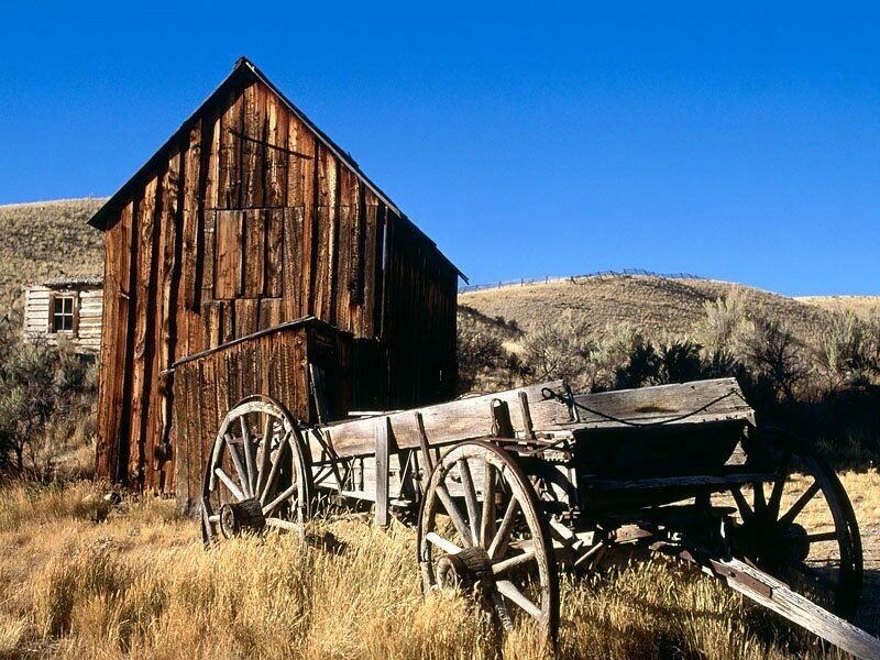 Old Wooden Wagon and Barn