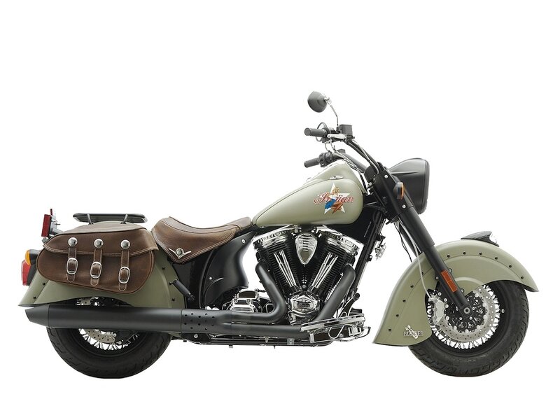 olive green motorcycle with saddlebags