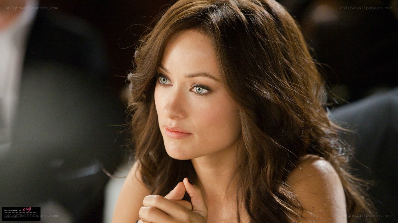 Olivia Wilde in a thoughtful pose