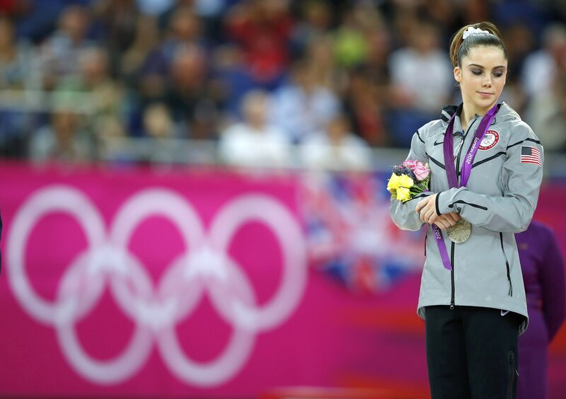 Olympic medalist with flowers