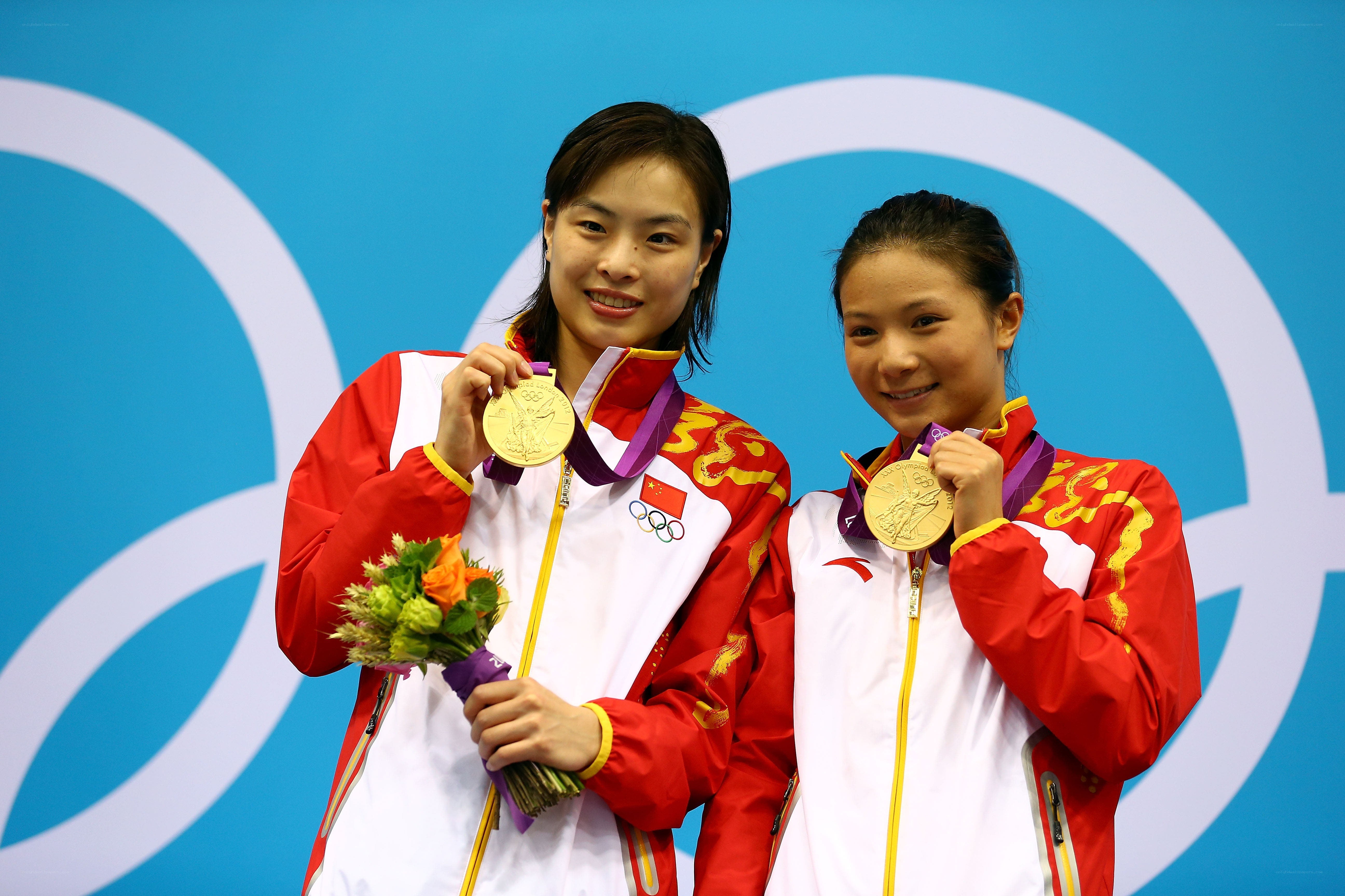 Olympic medalists posing