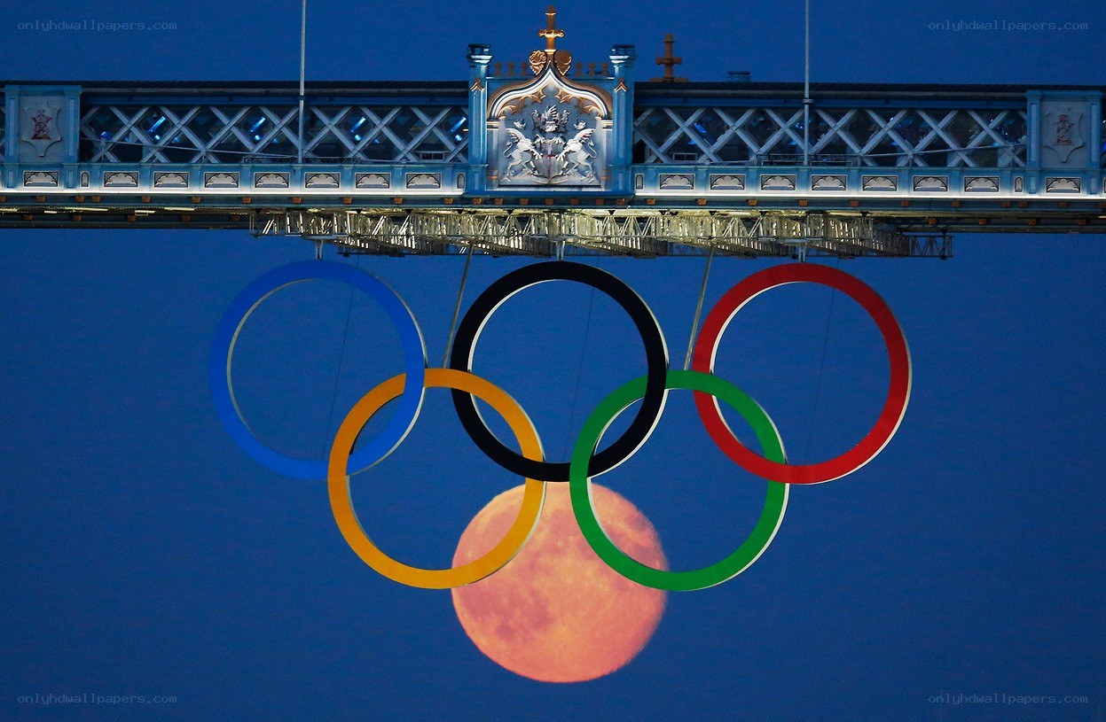 Olympic rings over moon