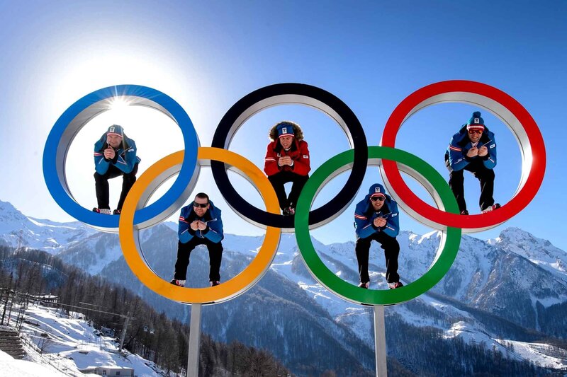 Olympic rings with athletes