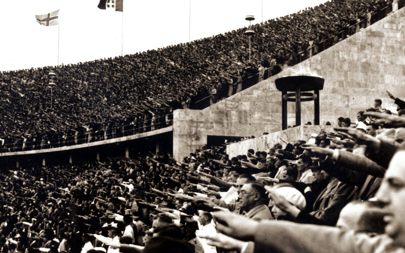 Olympic stadium crowd salute