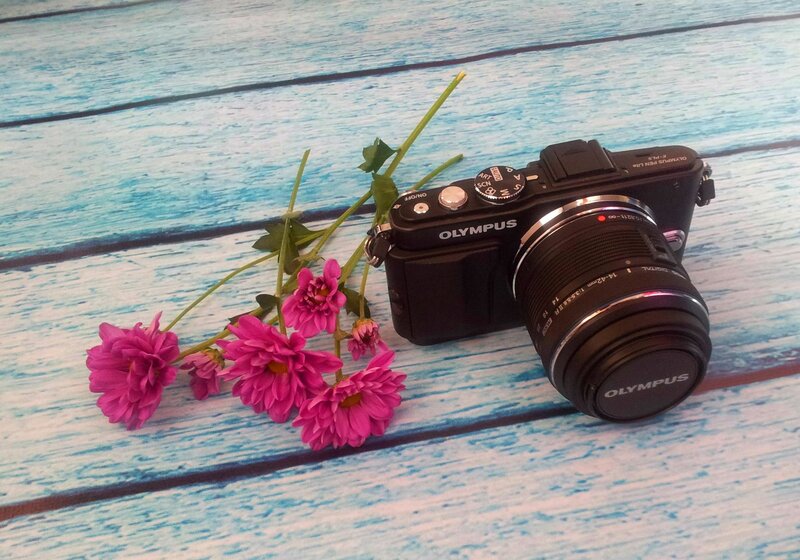 Olympus Camera with Flowers