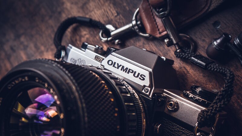 Olympus film camera on wood