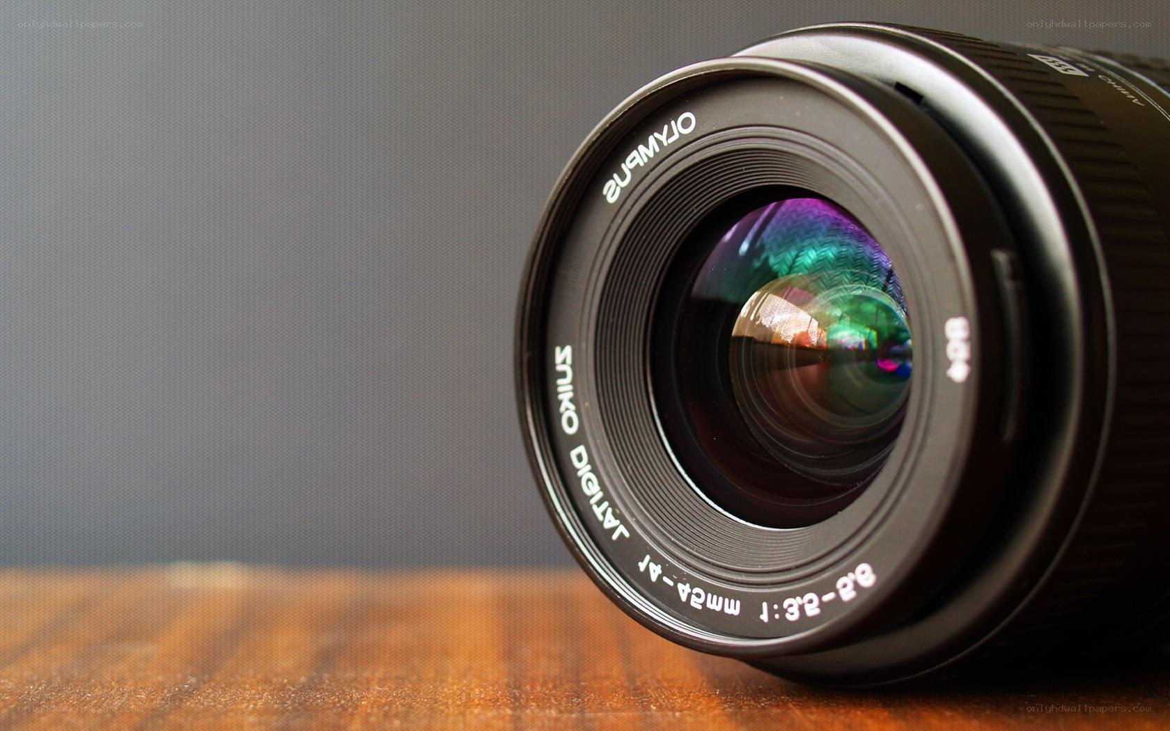 Olympus lens on wooden surface