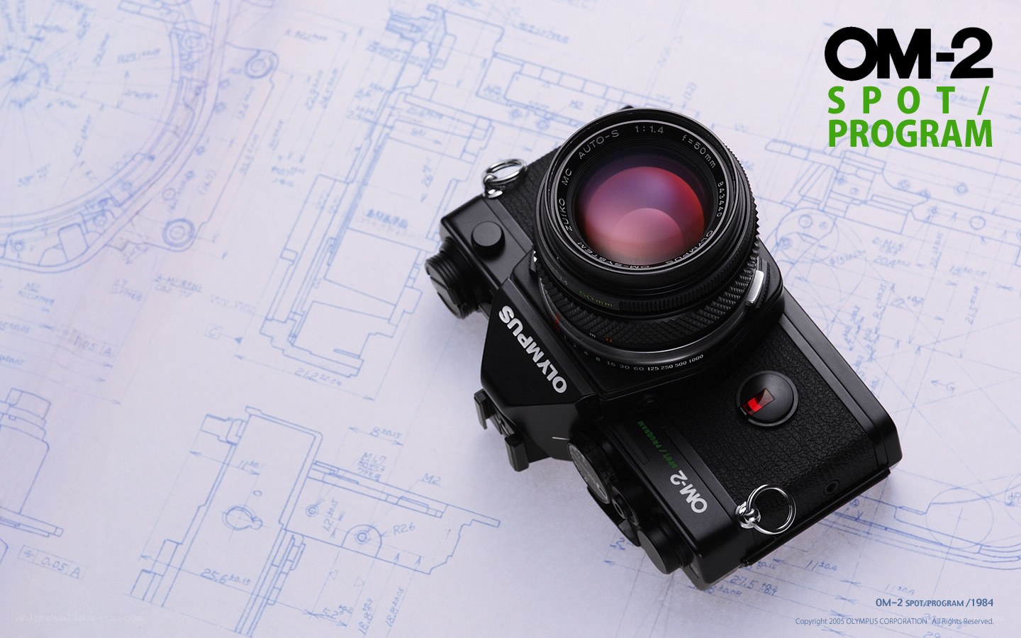 Olympus OM-2 camera on blueprint