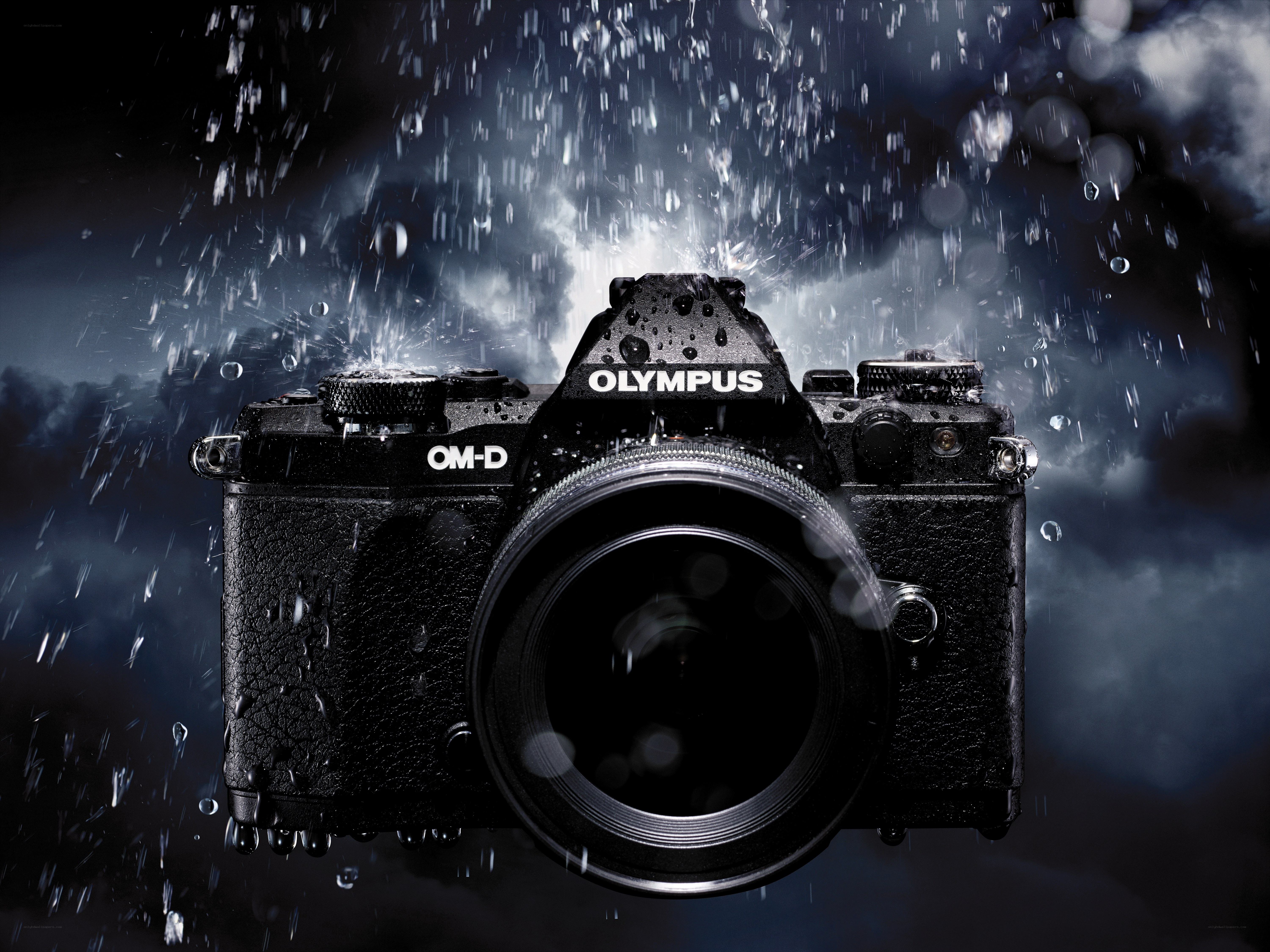 Olympus OM-D camera in rain