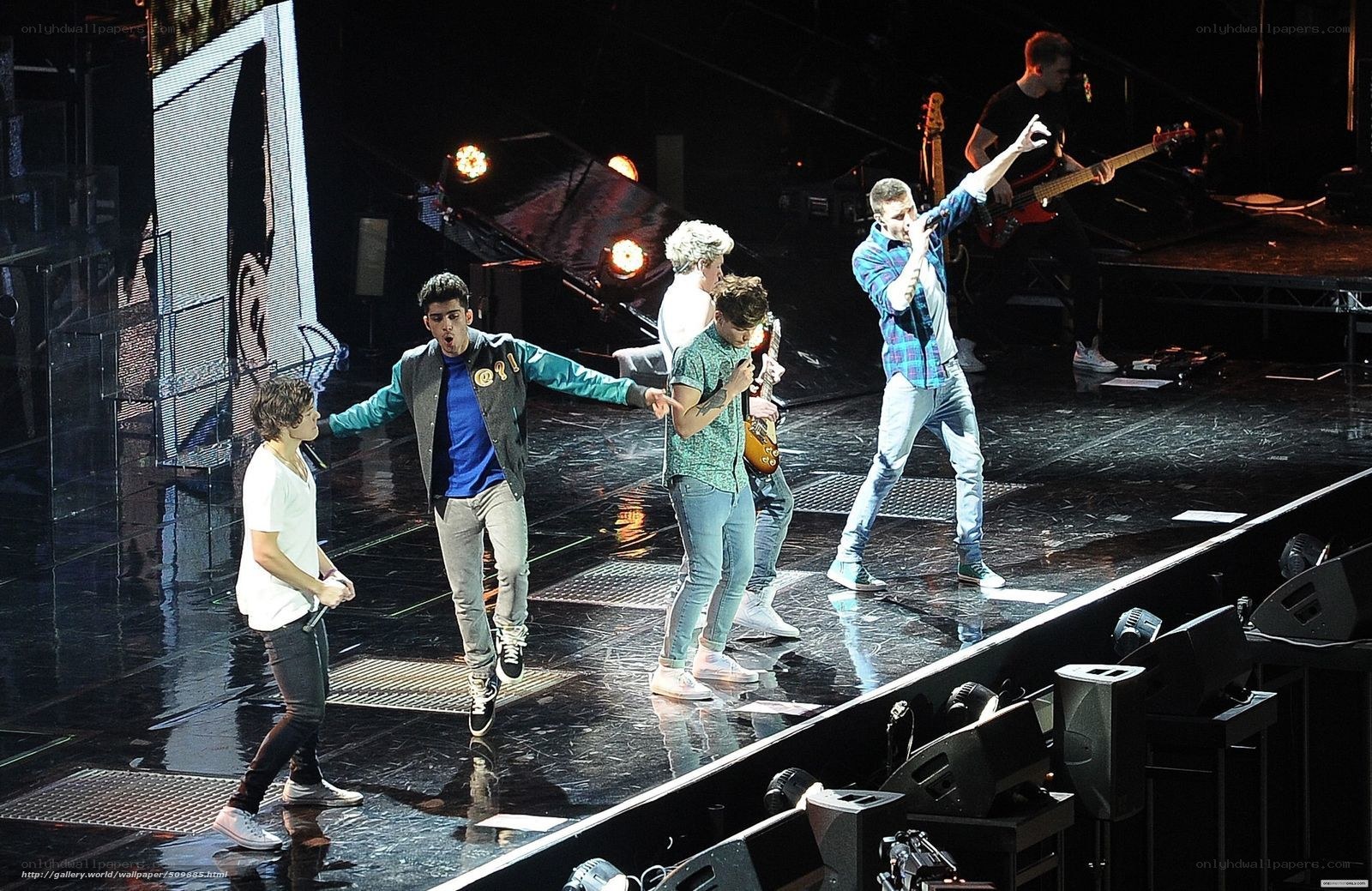 One Direction performing on stage