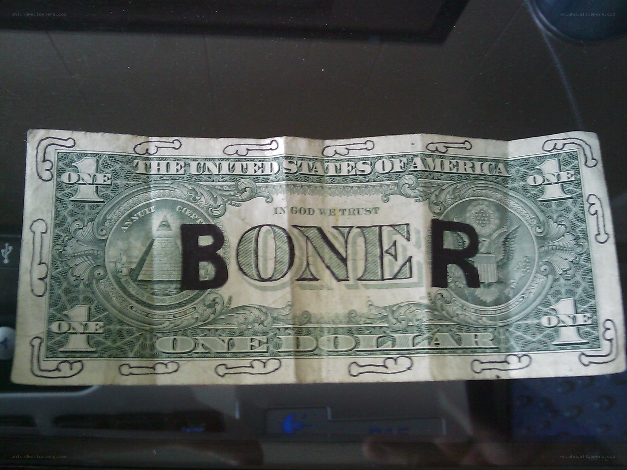 One dollar bill with altered text
