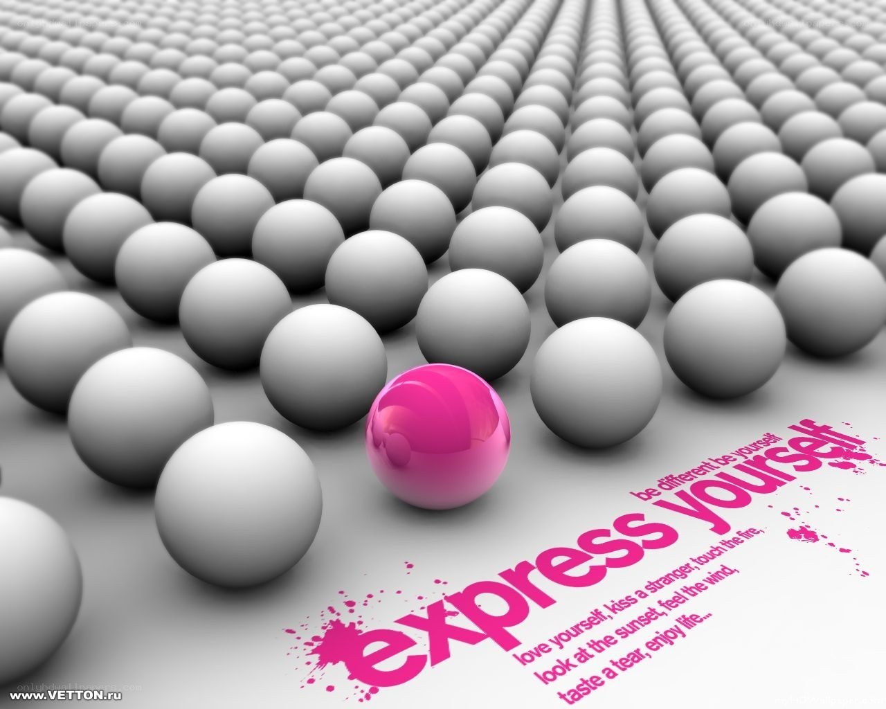 one pink ball among many gray