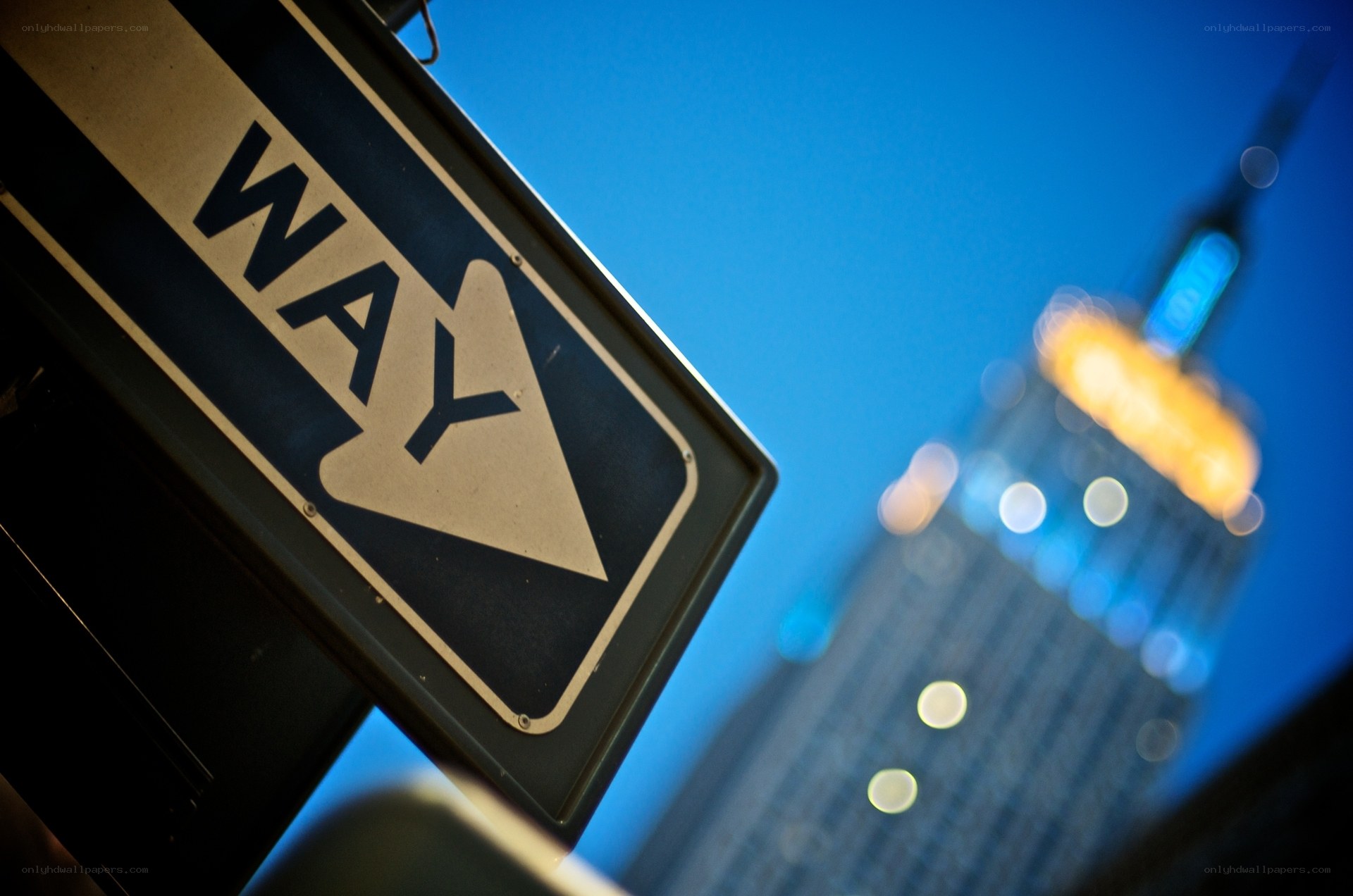 One Way sign with Empire State Building