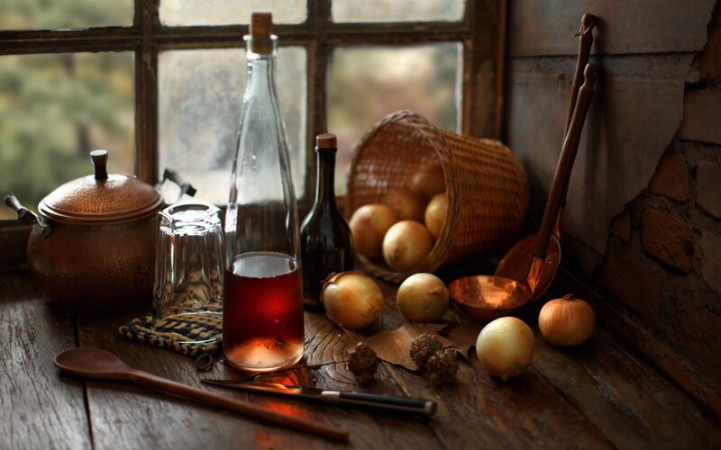 Onions and Bottles on Table