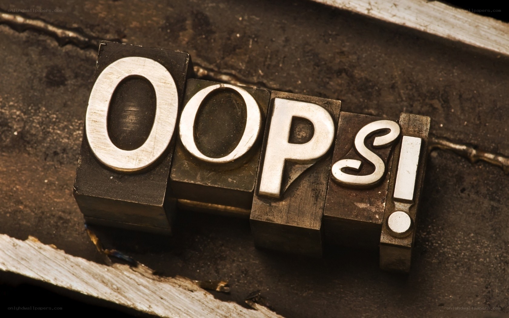 Oops word in letterpress blocks