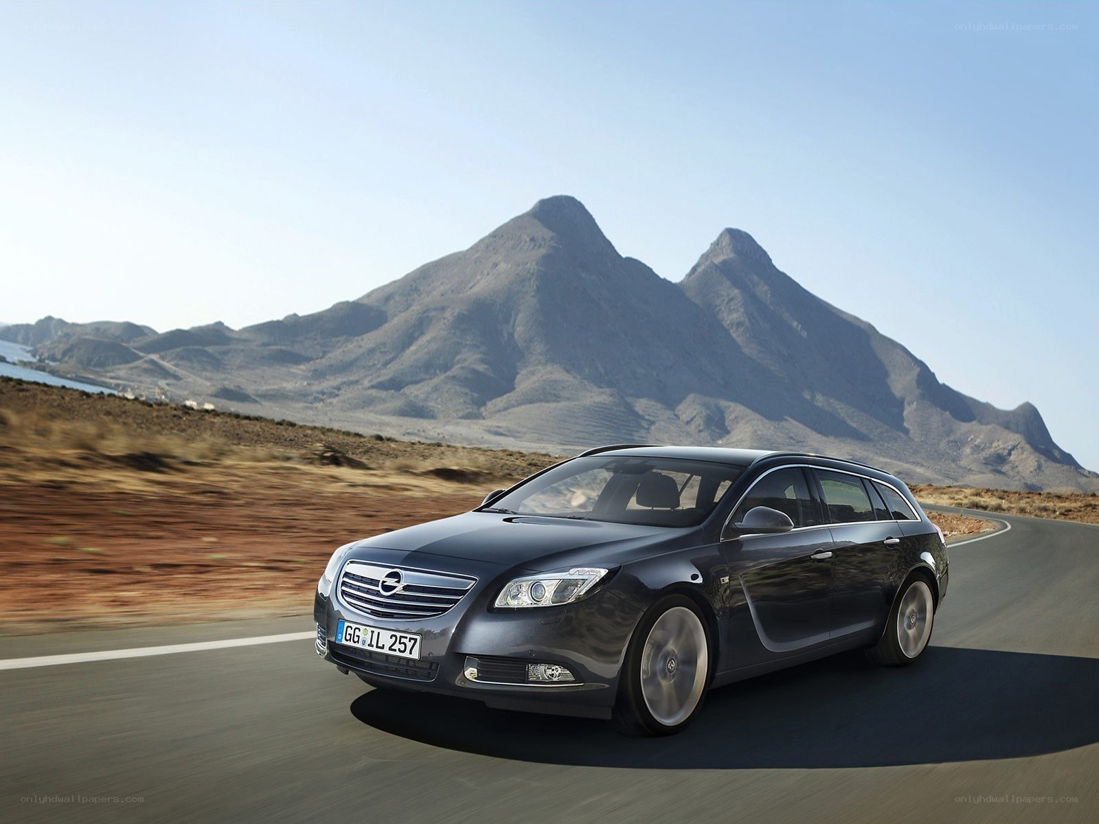 Opel Insignia driving on mountain road